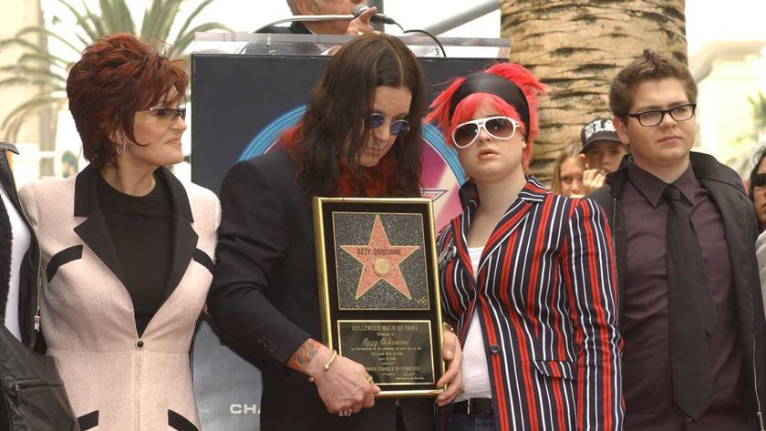 Ozzy Osbourne poses with his wife Sharon, daughter Kelly and son Jack during the ceremony honouring him with a star on the Hollywood Walk of Fame April 12, 2002 in Hollywood, CA.