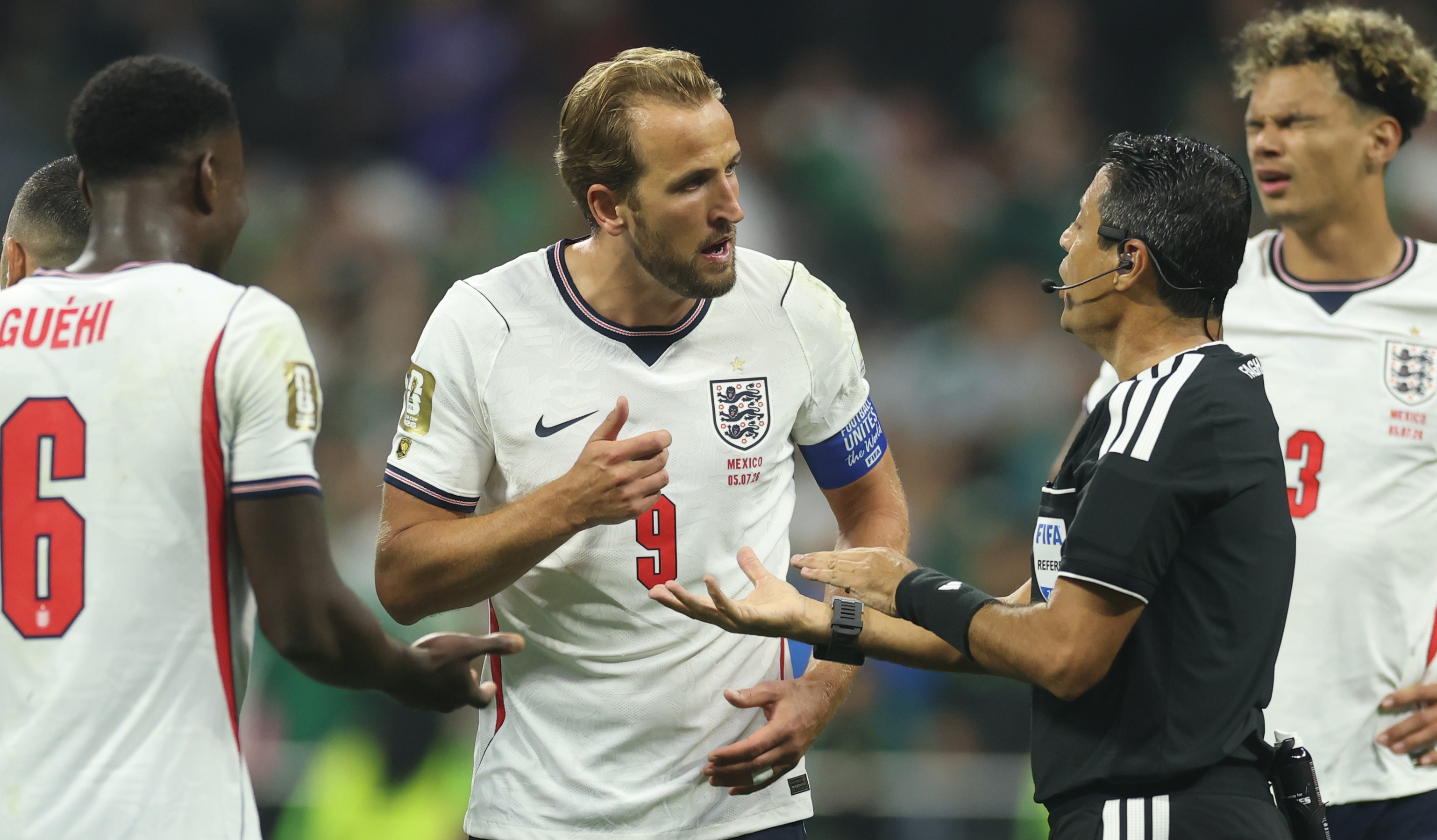 Harry Kane of England protests to Referee Alireza Faghani after a penalty kick is given to Mexico after his foul on Brian Gutierrez in the FIFA World Cup 2026 last match at Mexico City Stadium