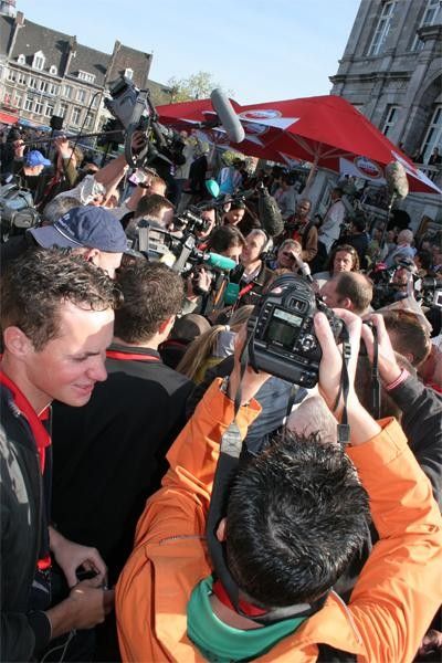 Local hero Michael Boogerd is somewhere in this media scrum