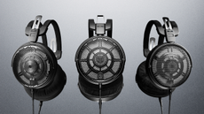 Product shot of the Audio-Technica ATH-ADX7000 headphones on a grey background