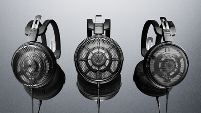 Product shot of the Audio-Technica ATH-ADX7000 headphones on a grey background