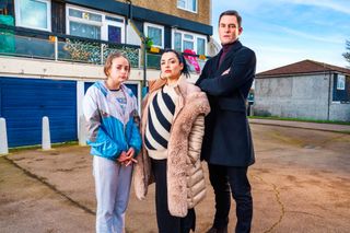 EastEnders Whitney Dean and Zack Hudson stand with Britney