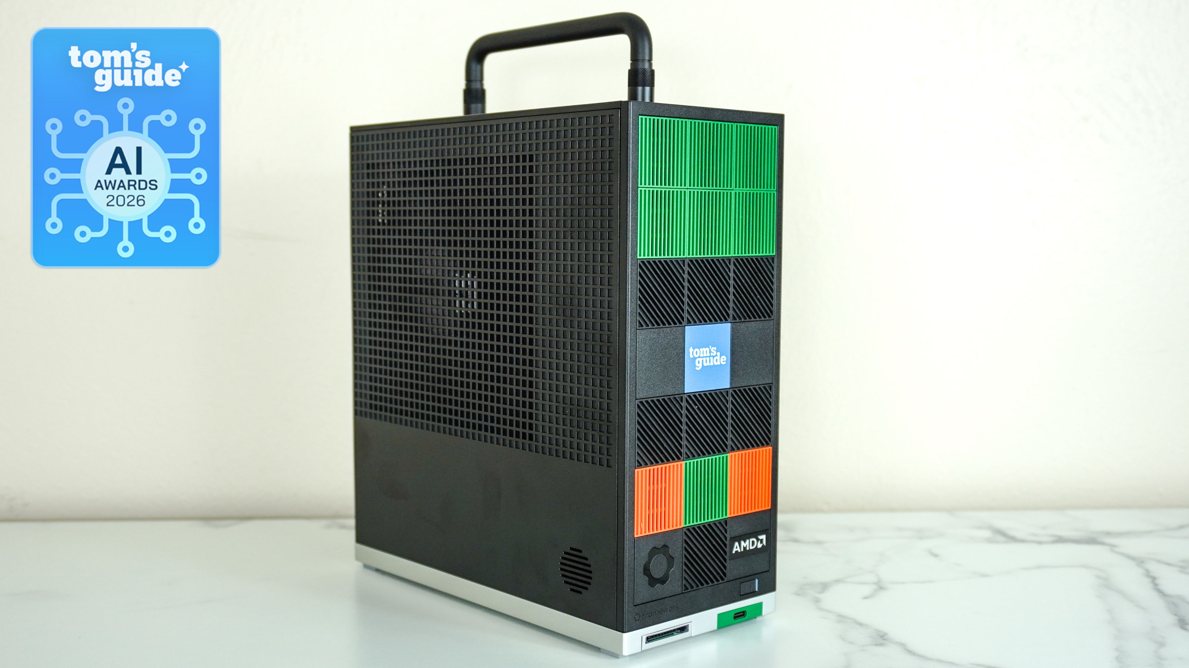 The Framework Desktop on a desk with a Tom's Guide AI Awards 2026 badge