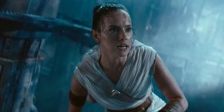 Rey (Daisy Ridley) crouches down in 'Star Wars: The Rise of Skywalker'