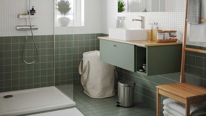 a green small bathroom with clever storage