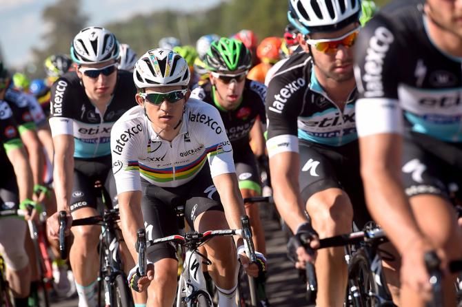 Michal Kwiatkowski rides in the peloton.