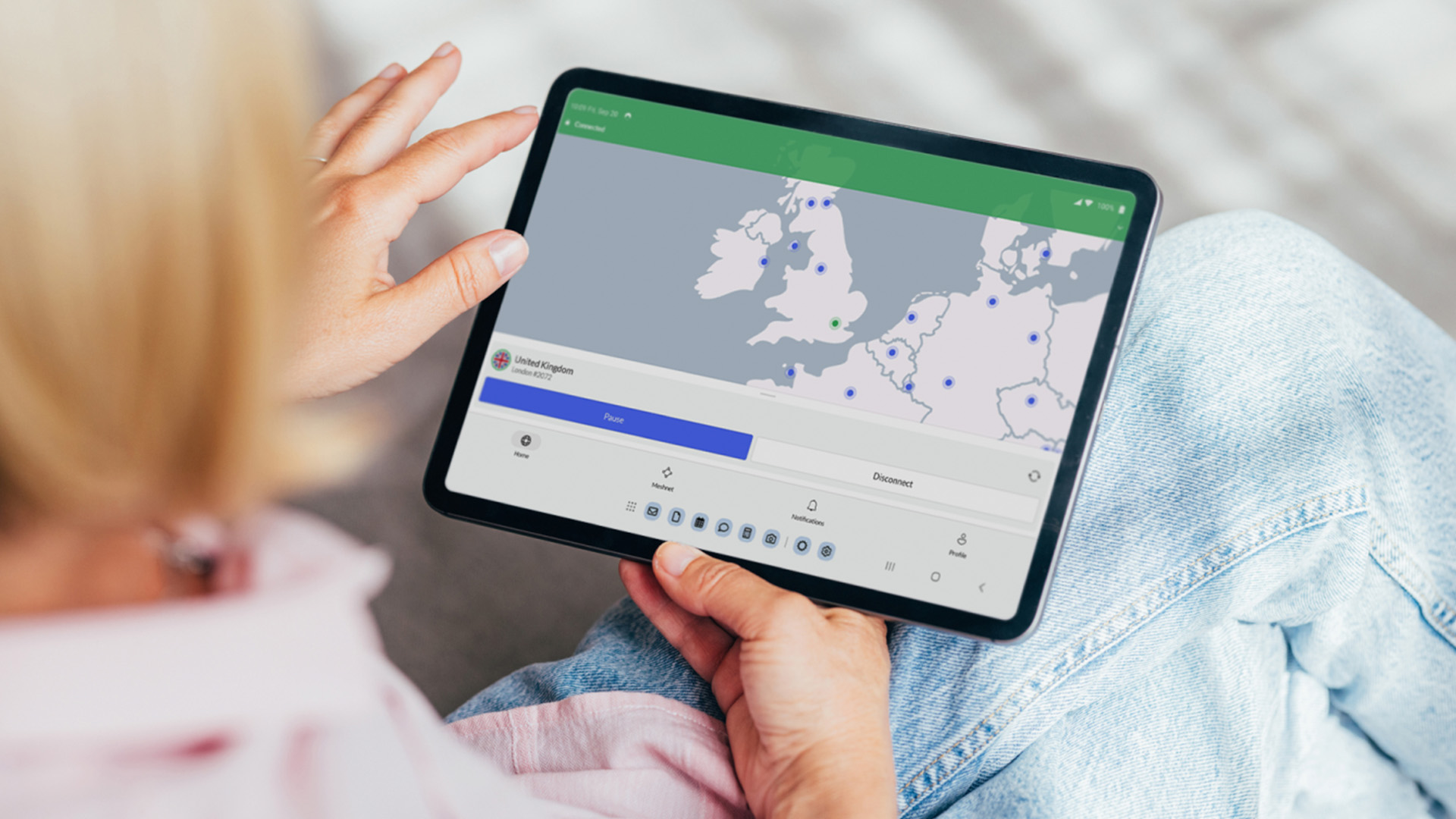 NordVPN app on mobile device, being used on the beach