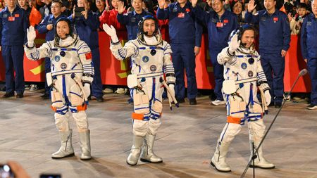 The Shenzhou-21 crew of Zhang Lu (right), Wu Fei (center) and Zhang Hongzhang (left) before they launched into space on Oct. 31.