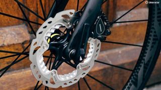 Shimano hydraulic disc brakes come with 160mm rotors, for those concerned about heat dissipation
