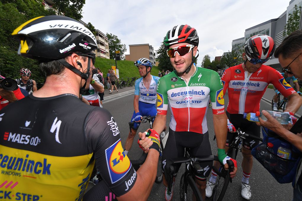 Elia Viviani is congratulated after winning stage 4 at Tour de Suisse
