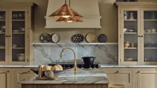 Neutral kitchen with rattan lighting