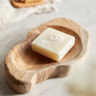 wooden soap dish with soap on top