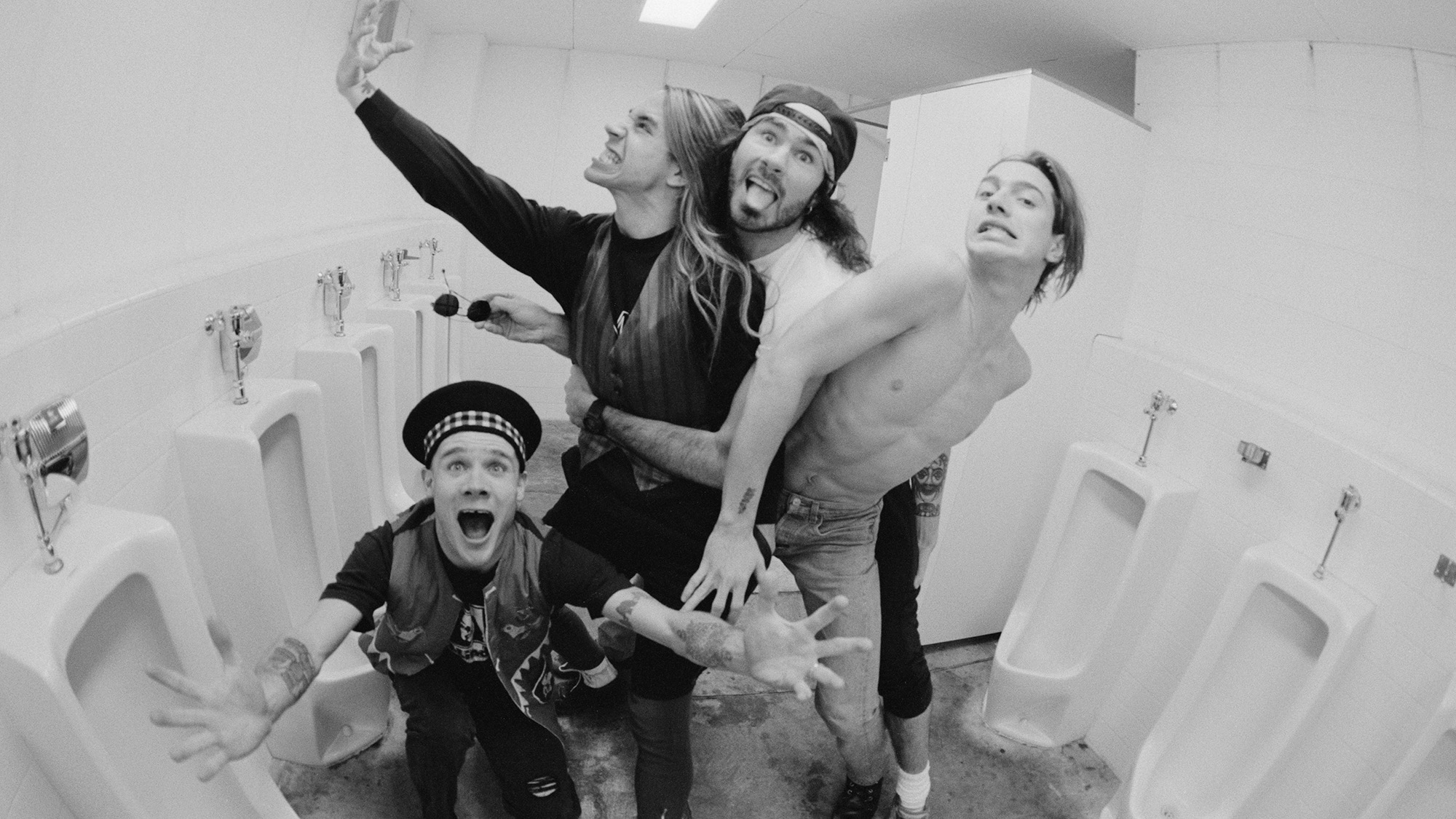 Red Hot Chili Peppers, photo shoot backstage in Club Citta Kawasaki, Kakagawa, Japan, 27th January 1990. (L-R) Michael 'Flea' Balzary (bass), Anthony Kiedis (vocals), Chad Smith (drums), John Frusciante (guitar).