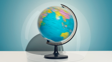 World globe photographed while spinning fast.