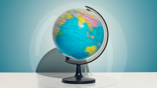 World globe photographed while spinning fast.