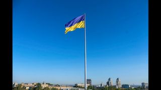 Ukraine's flag above the city of Dnipro.