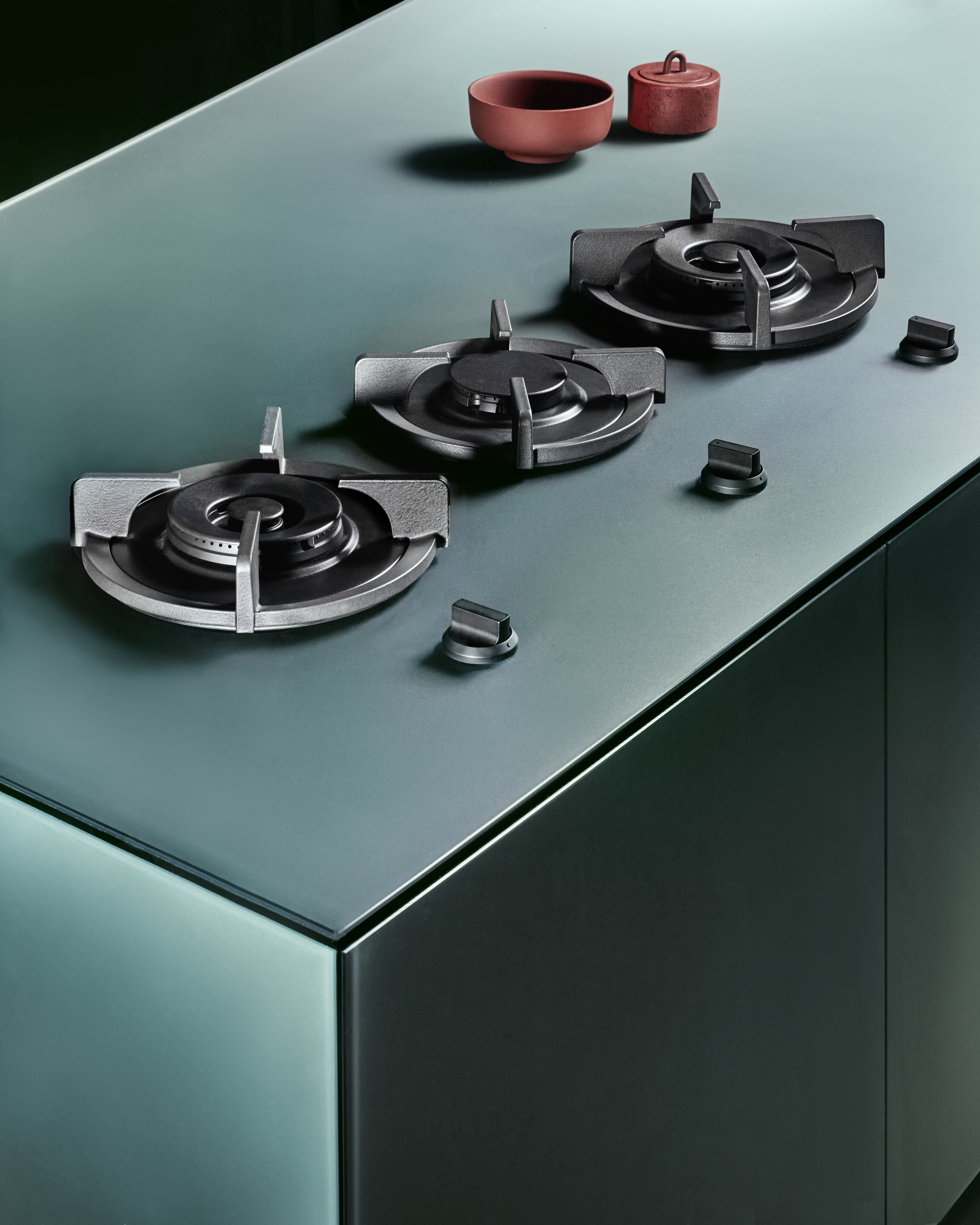 Kitchen top in light blue and green glass