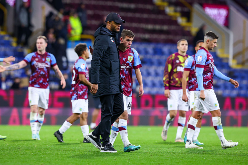 Burnley manager Vincent Kompany hugs Joe Bauress after the Carabao Cup Third Round match between Burnley and Crawley Town at Turf Moor on November 8, 2022 in Burnley, England.