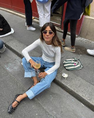 Spanish fashion influencer Vicky Montanari wearing cuffed jeans and embellished ballet flats
