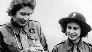 Queen Elizabeth II wearing her scout uniform