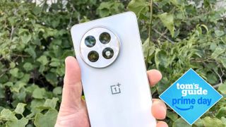 OnePlus 13R in hand with prime day logo