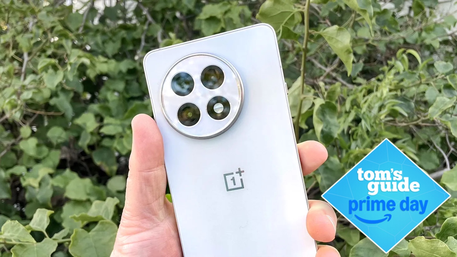 OnePlus 13R in hand with prime day logo