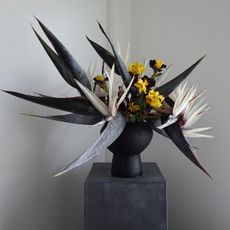 a fresh flower arrangement in a gray vase