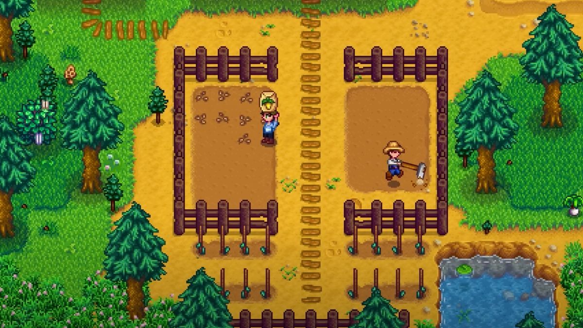 Two players work together on a farm in Stardew Valley