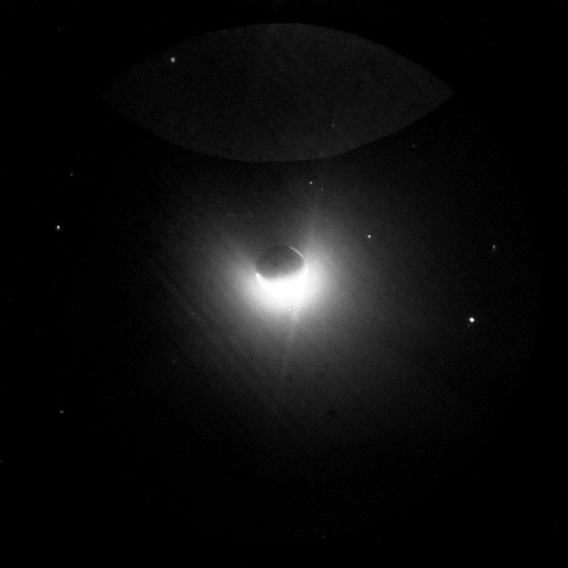 Earth and its hydrogen envelope as seen from the moon.