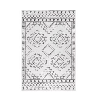 A black and white Moroccan style entryway rug