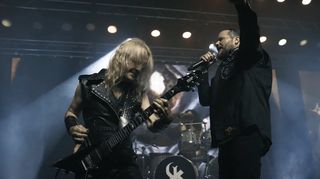 K.K. Downing (left) and Tim "Ripper" Owens in the music video for KK's Priest's Raise Your Fists