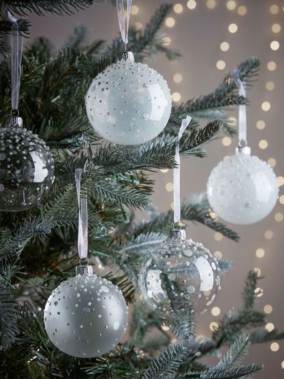 How to style a Christmas tree – from on-trend looks to classic styles