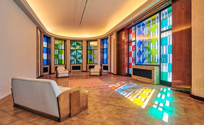 installation view of Daniel Buren's colourful glass squares