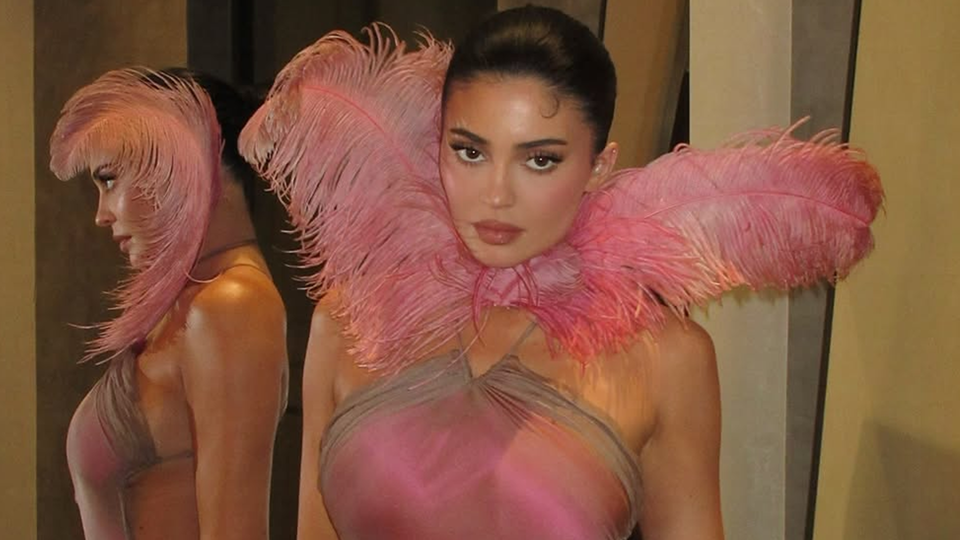 Kylie Jenner wore a fresh-off-the-runway pink Conner Ives gown to her Kylie Cosmetics holiday party