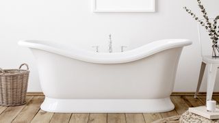 white bathroom with white freestanding bath