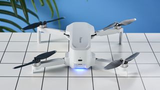 A gray Potensic Atom 4K drone