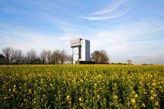 Dramatic water tower conversion into a home by tonkin liu architects in the english countryside