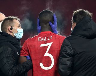 Eric Bailly was forced off with a head injury