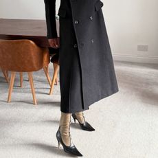 An image of @nlmarilyn wearing one of the leading winter boots trends of 2025. 