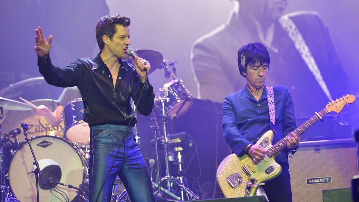 Brandon Flowers of The Killers performing with Johnny Marr at Glastonbury 2019