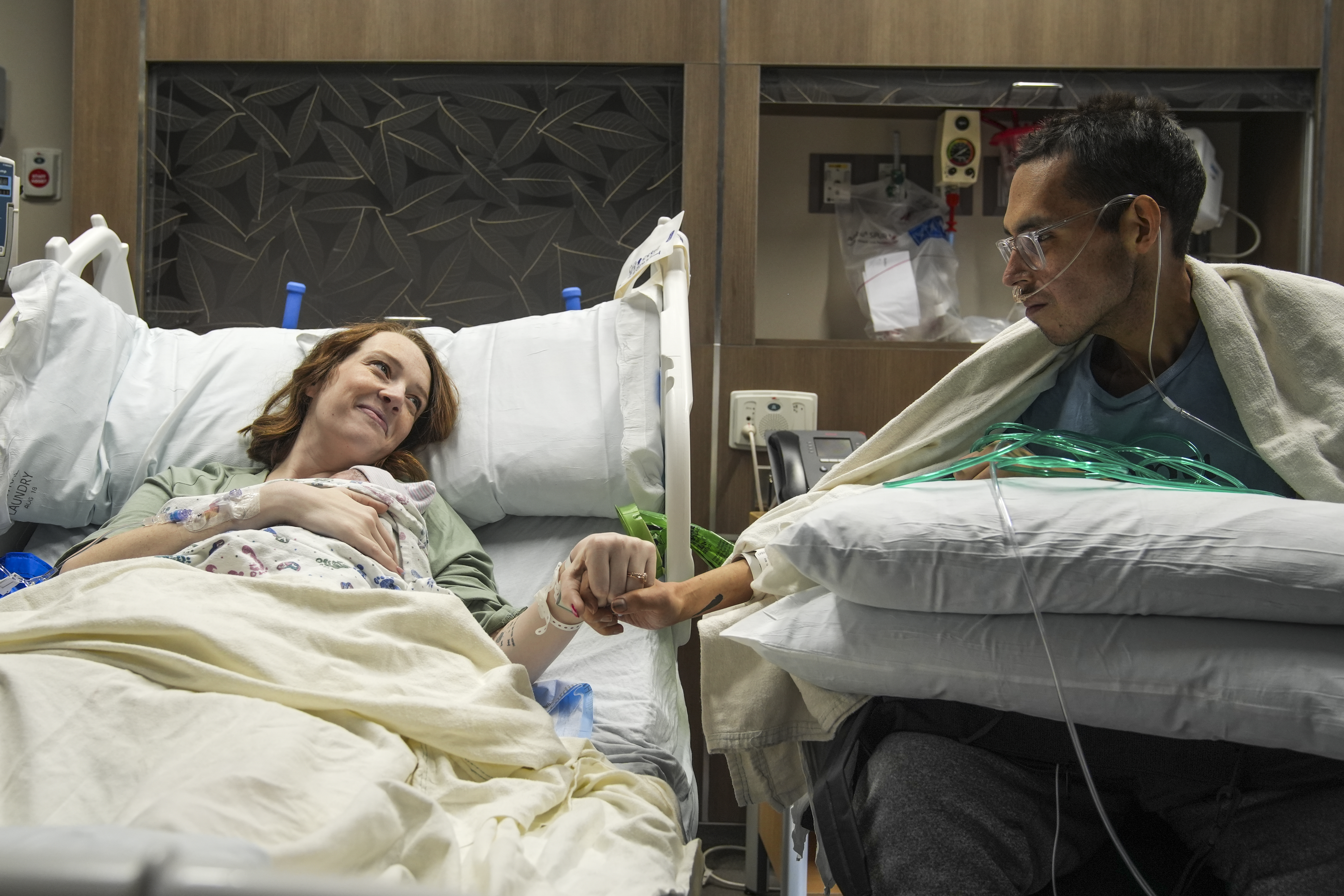 Shay Martin, 29, and Tanner Martin, 30, take in the reality of the birth of their daughter, Amy Lou, in a birth recovery room at Intermountain Health American Fork Hospital on May 15, 2025