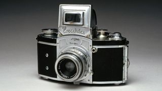 By the 1930s, new miniature cameras were on the market. They were light, convenient to carry, and could be used quickly and unobtrusively. They became popular with a new breed of photojournalist. The Exacta was the first of its type and is the direct ancestor of all modern 35mm SLRs. Manufactured by Ihagee Kamera Werk, Dresden, Germany. (Photo by SSPL/Getty Images)
