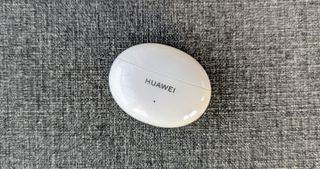 Huawei Freebuds 5i review: charging case on grey background