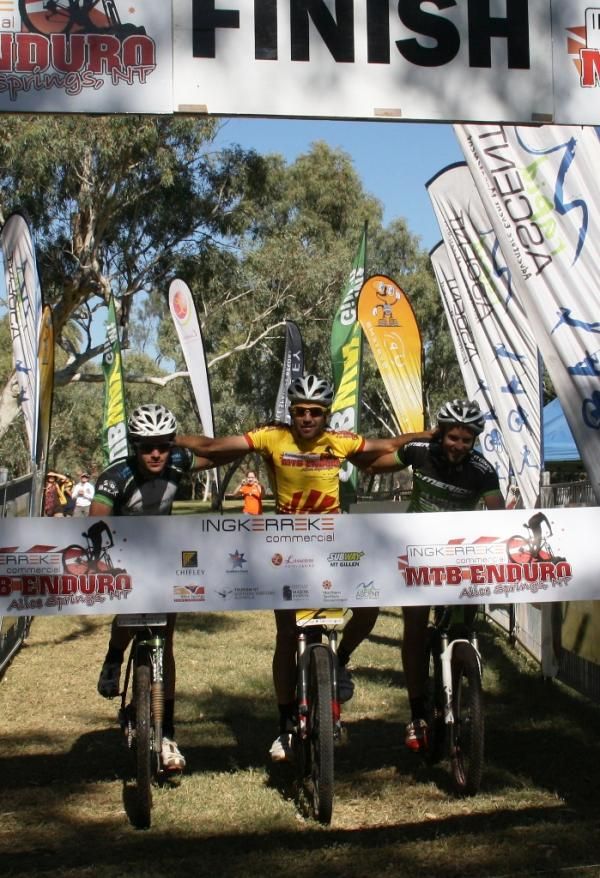 The top three men wrap up the race together