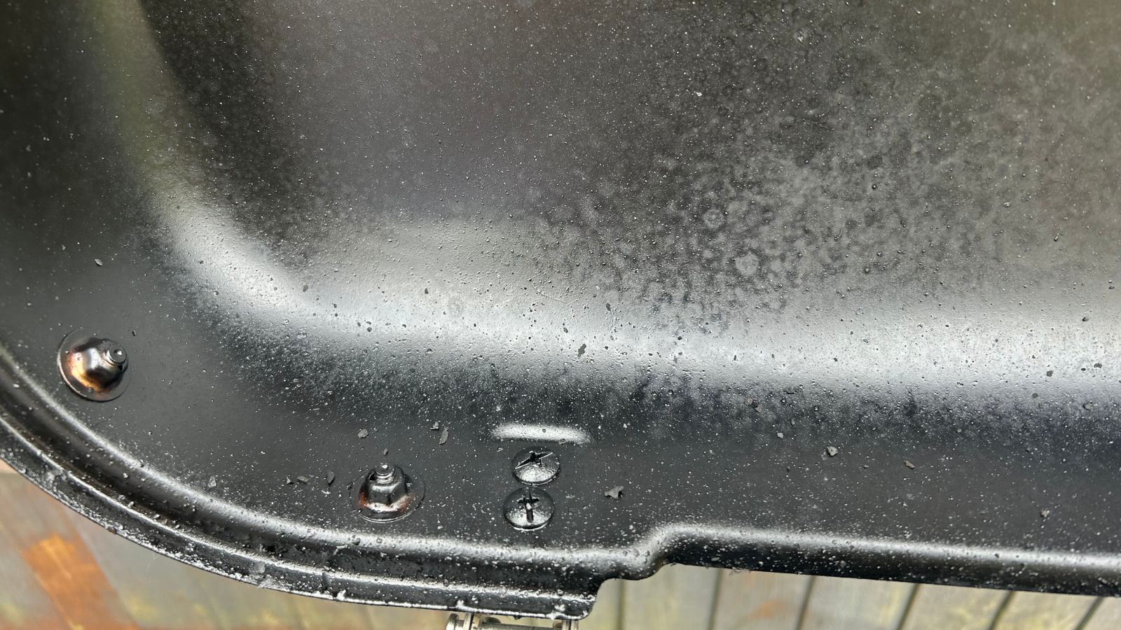 Grill lid open, before being cleaned, dirty