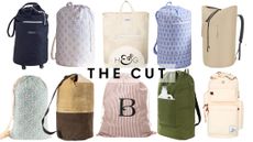 Stylish dorm room laundry bags, including whimsical, farmhouse, retro, and classic monogram styles, pictured against a white background