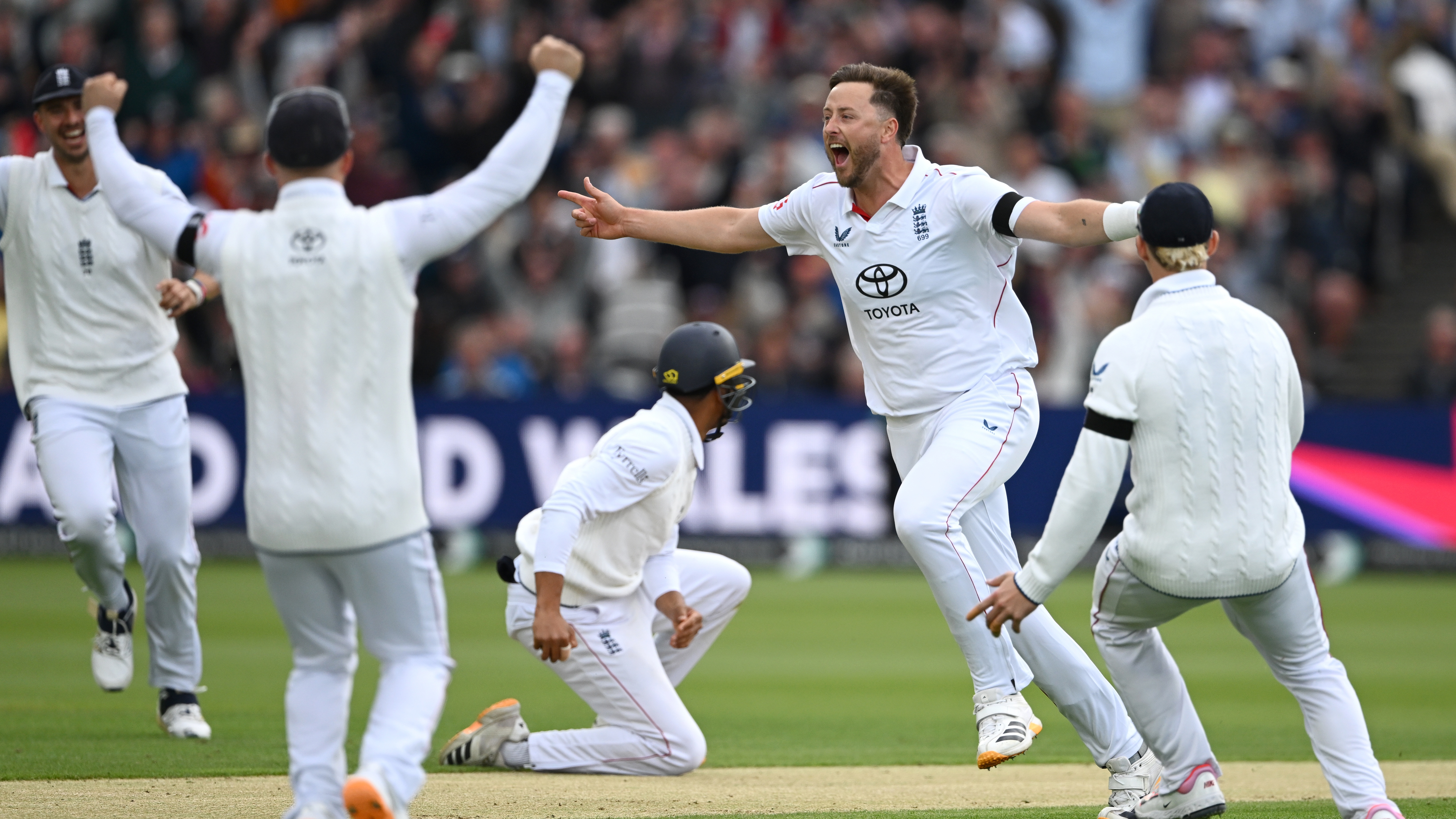  England bowler Ollie Robinson celebrates after taking the wicket of Kane Williamson, caught by Emilio Gay (c) during day one of the 1st Rothesay Test Match between England and New Zealand 