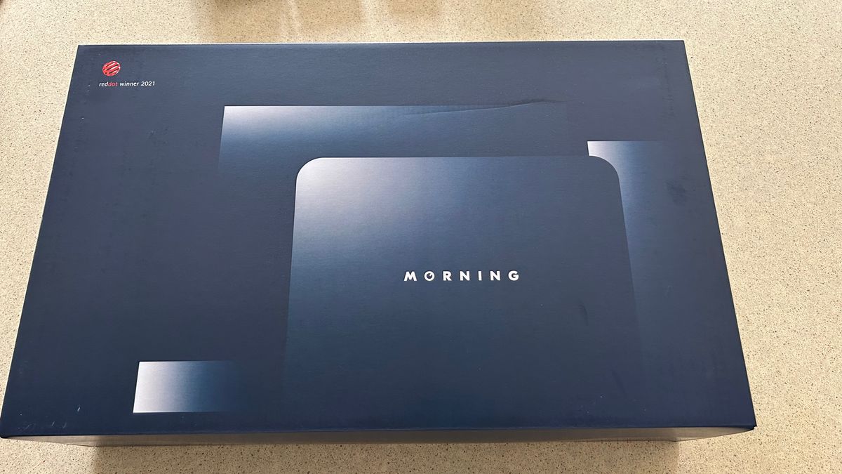 Removing the branded coffee maker box when reviewing the morning coffee maker