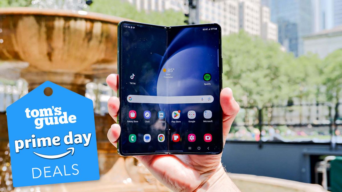 samsung galaxy z fold 5 in front of a fountain with a prime day deal tag