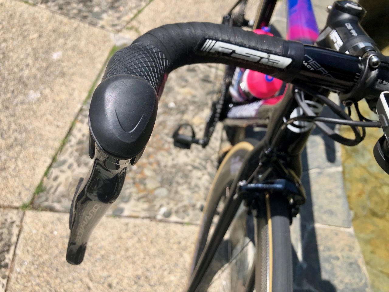 Martinez has setup his satellite buttons on the top of the shifter hoods to change gear, which could help while climbing